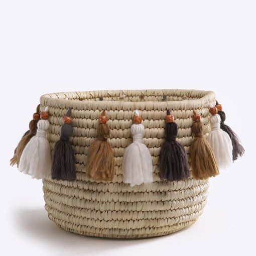 Handcrafted wicker storage basket wool tassel